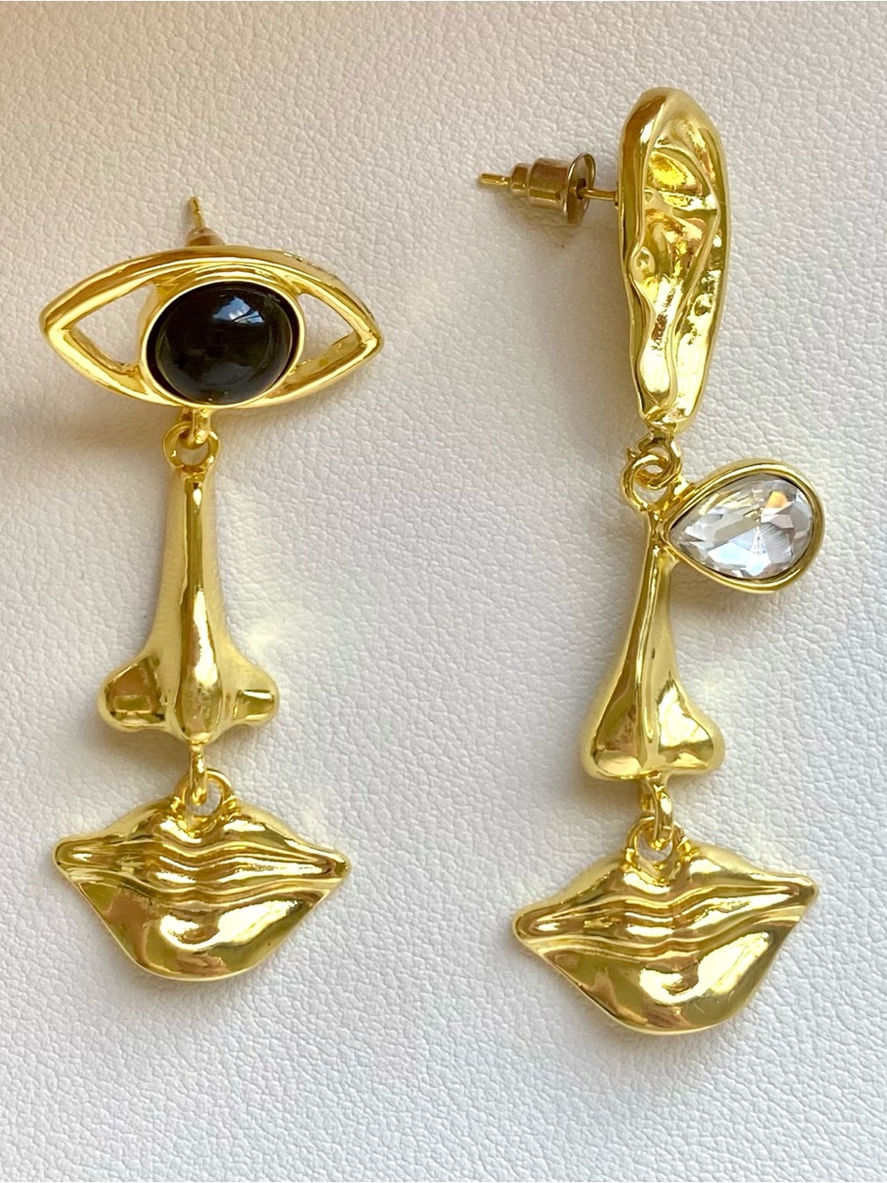 Gold Face Drop Earrings with Black Accent and Clear Stone